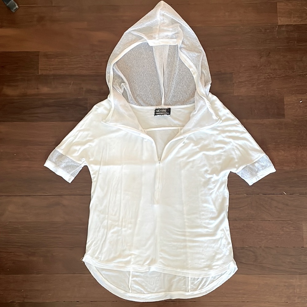 Lime and Vine top with mesh hood and sleeve detail, front invisible v neck zip